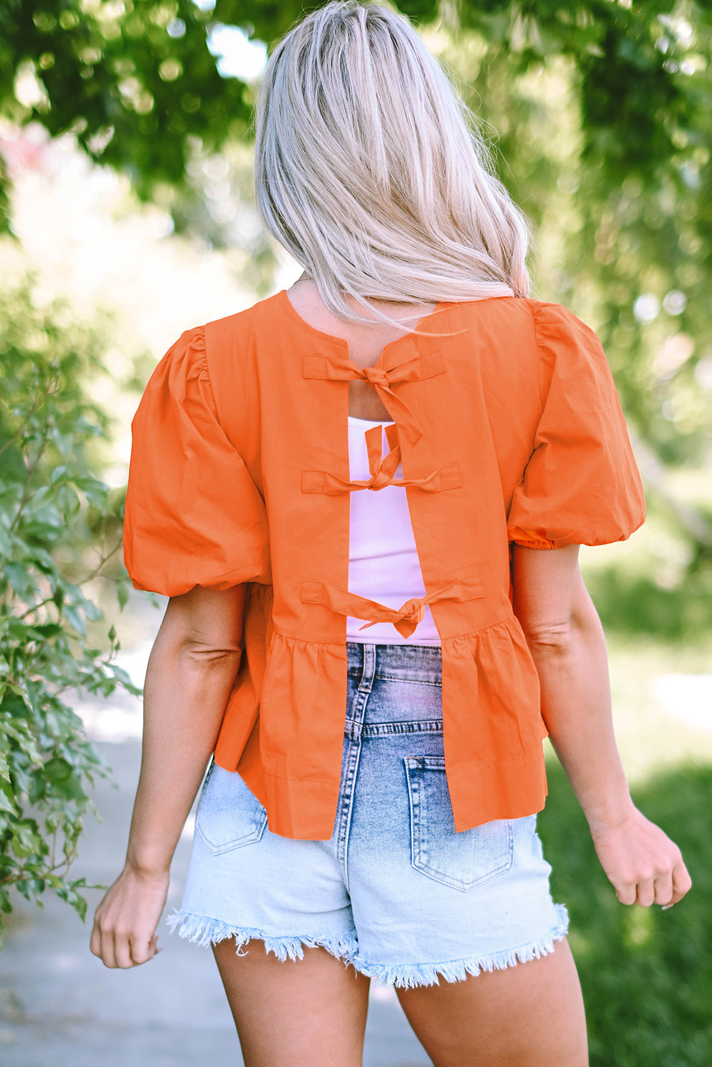 Grapefruit Orange Knotted Puff Short Sleeve Peplum Blouse